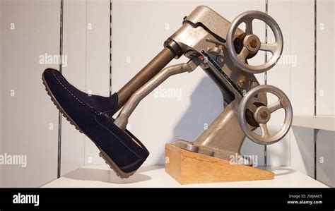 vintage shoe stretching in stretcher shoes machine Stock Photo - Alamy