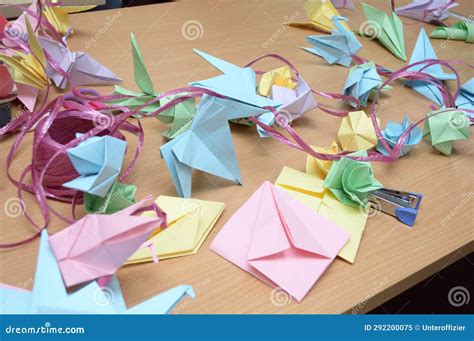 Origami Paper Folding Activities In Progress Showing Finished Colored