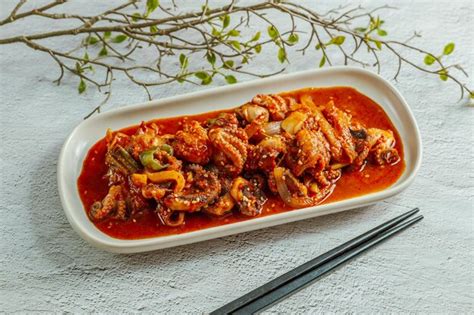 Premium Photo | Korean style stir-fried ocellated octopus jjukkumi bokkeum