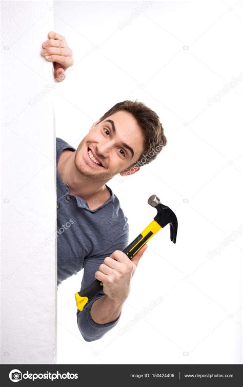 Man holding hammer — Stock Photo © DmitryPoch #150424406