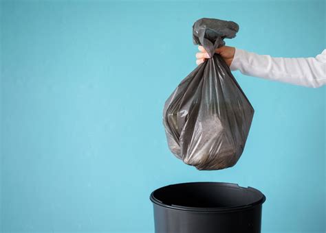 How To Put A Trash Bag In The Trash Can Storables