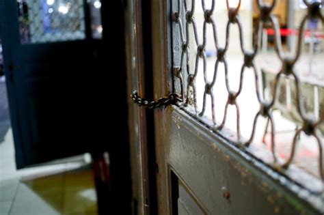 Premium Photo Close Up Of Metal Fence Against Blurred Background