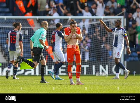 James Husband 3 Of Blackpool Looks Dejected At Full Time As He Buries