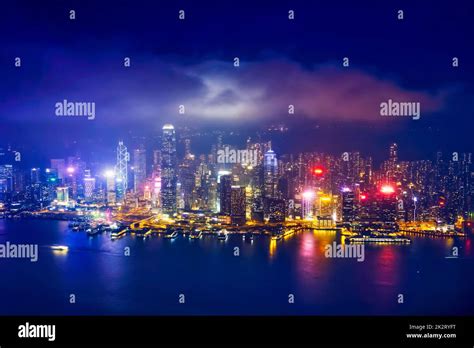 Aerial view of illuminated Hong Kong skyline. Hong Kong, China Stock ...