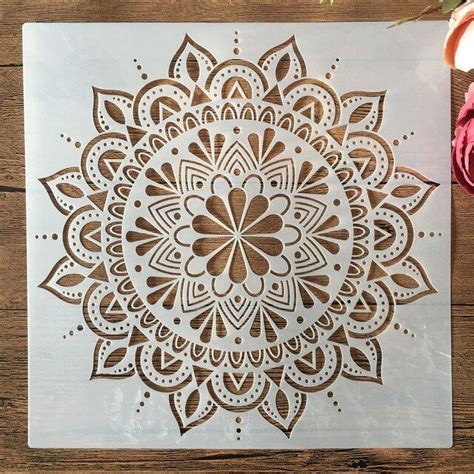 An Intricately Designed Paper Cutout On A Wooden Surface With Purple