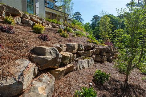 Hillside landscaping with natural stone and water accents in Smyrna, GA ...