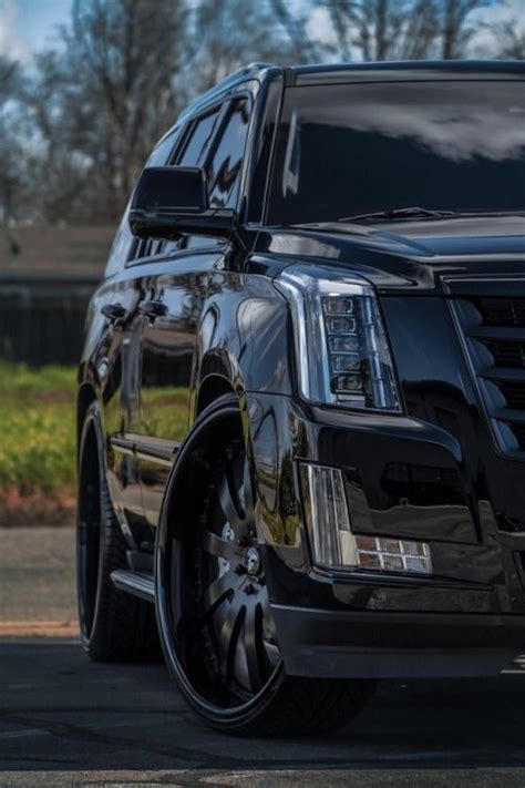 Blacked Out Cadillac Escalade On Forgiato Wheels