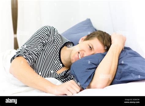 Man Sleeping In Bed Stock Photo Alamy