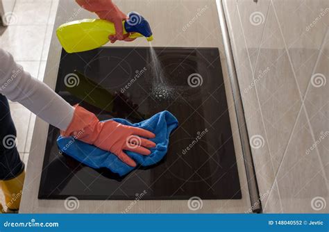 Induction Hob Cleaning Royalty-Free Stock Photography | CartoonDealer.com #64961273