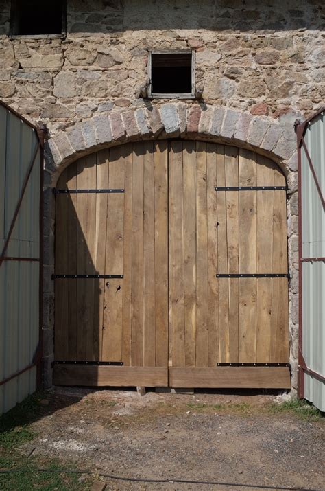 Porte de grange en chêne par dneis sur L Air du Bois