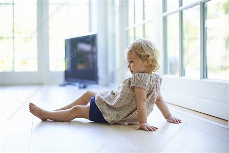 Toddler Sitting On Living Room Floor Stock Image F0119179