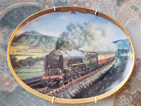 Solve Ornamental Plate Featuring A Steam Locomotive Jigsaw Puzzle