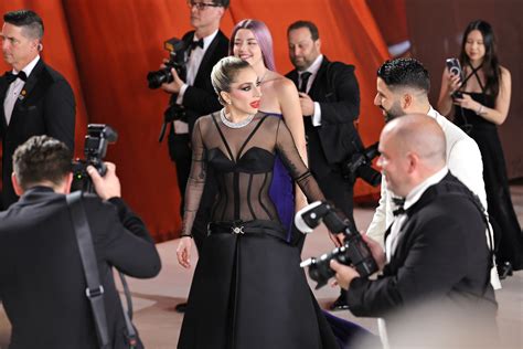 Lady Gaga Rushing to Help Someone on Oscars 'Red Carpet' Goes Viral ...