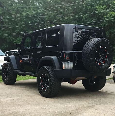 Black Jeep Wrangler Custom with Matte Glossy Rims & Lights