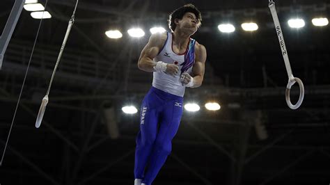 Japans Kazuyuki Takeda Competes In The Mens Rings Final Of The