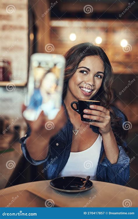 The Only Filter In This Selfie Is The Coffee A Happy Young Woman Using