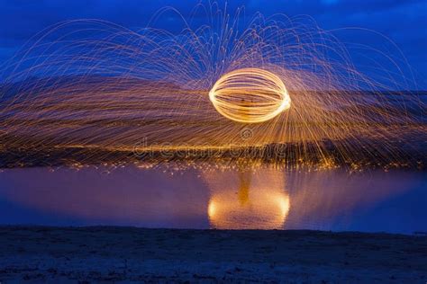 Light Painting Wheel of Fire at Blue Dusk Stock Image - Image of flame ...