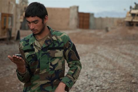 An Afghan National Army Special Forces Soldier Follows Nara And Dvids