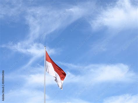 The Merah Putih Flag. View from below. Indonesian flag consist of red ...