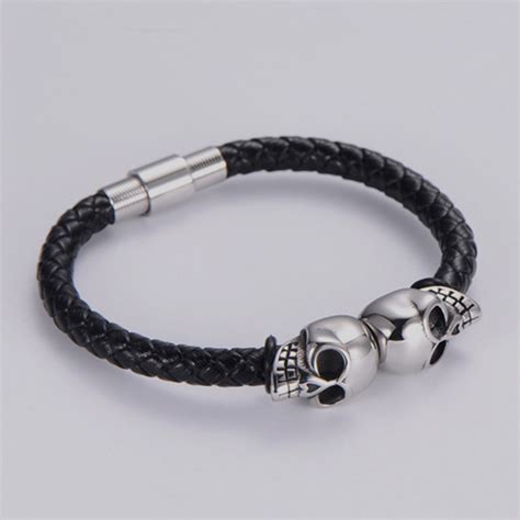 Pulsera negra estilo dos craneos marca Calak clásico 142195