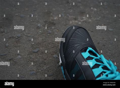 running shoes on the beach Stock Photo - Alamy