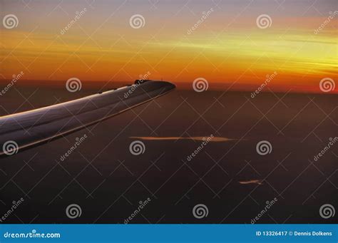 Wing of Aircraft during Sunset Stock Image - Image of boeing, outback ...