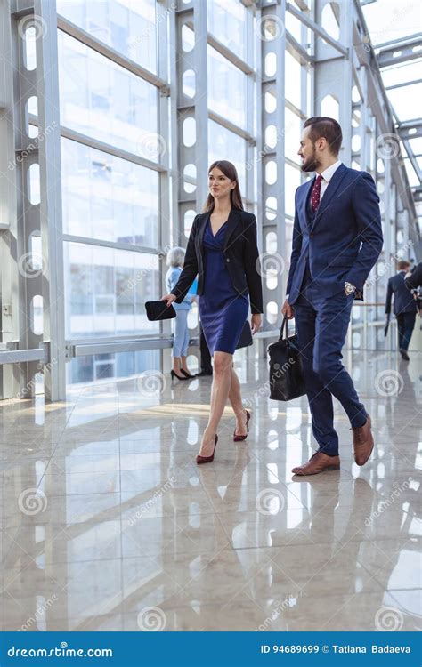 Business People Walking In Office Corridor Stock Image Image Of