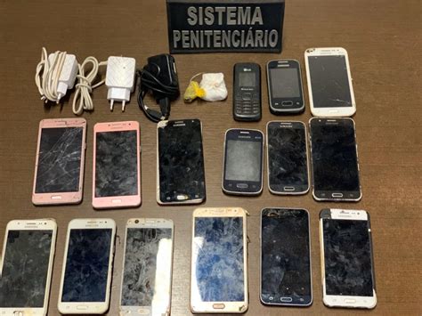 Apreendidos 15 celulares jogados por cima do muro do presídio de Jataí