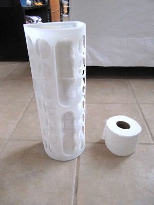 An Ikea Plastic Bag Holder Fastened To Toilet To Hold Extra Rolls Sew