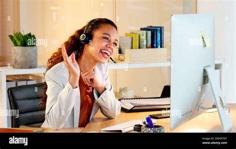 A Happy Modern Business Woman Having An Online Meeting At Her Computer