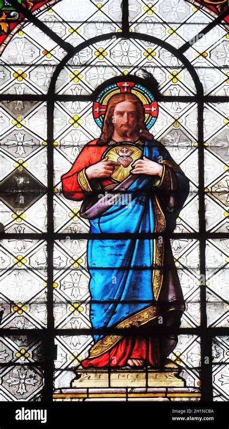 Sacred heart of Jesus, stained glass window in the Basilica of Notre ...