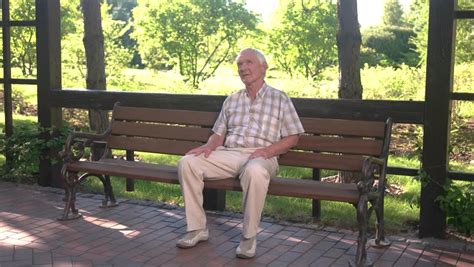 old man sitting on bench elderly Stock Footage Video (100% Royalty-free ...