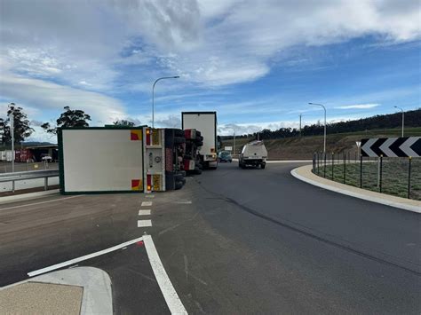 Road Partially Blocked After Truck Trailer Rolls Over At Kingston