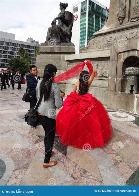 Quinceanera Posing in a Red Dress in Mexico City Editorial Image
