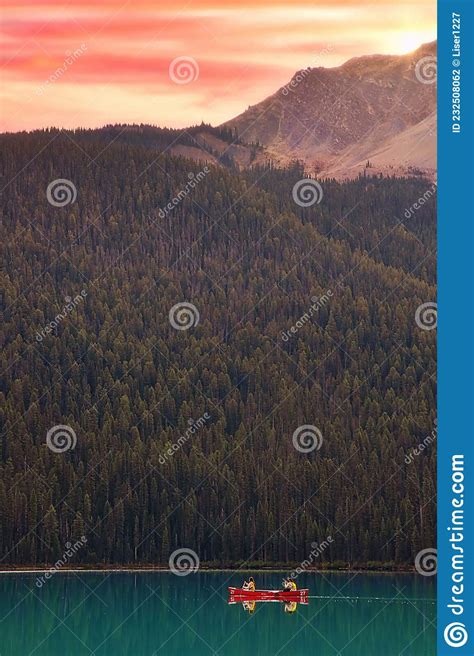 Sunrise Canoe Ride on Emerald Lake Stock Photo - Image of reflection ...