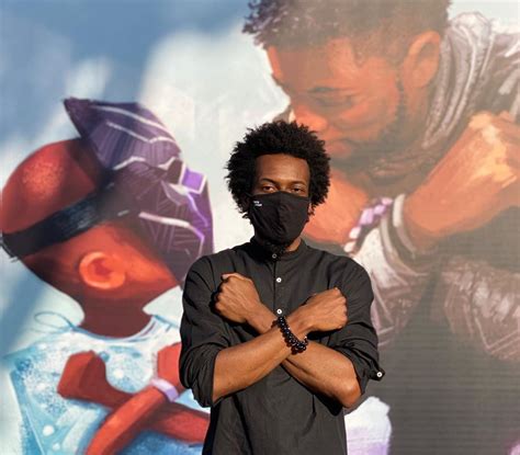 Nikkolas Smith unveiling Chadwick memorial mural in downtown Disney ...