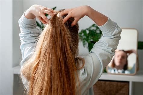 Free Photo Woman Giving Herself Scalp Massage