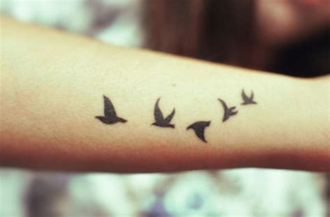 Black Bird Tattoo On Arm