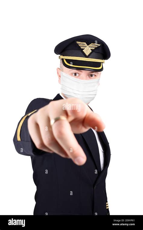 kapitän in der Uniform in der Maske zeigt seinen Finger Stockfotografie ...