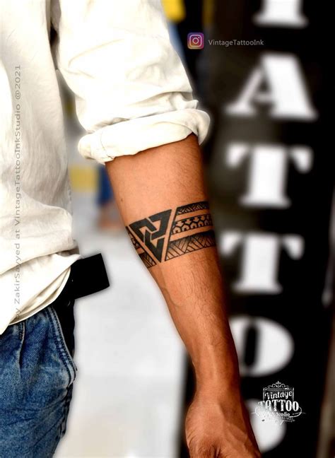 Arm band tattoo | Arm band tattoo, Band tattoo, Forearm band tattoos