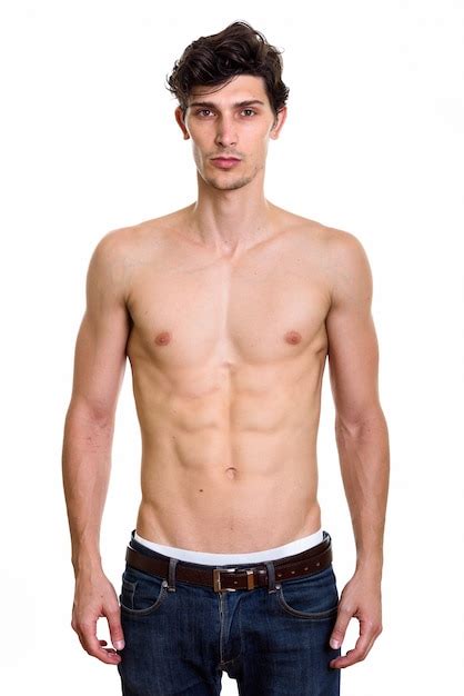 Premium Photo Studio Shot Of Young Handsome Man Standing Shirtless