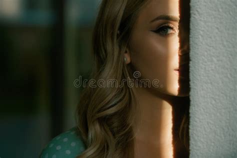 Woman Spy Face In Shadow Portrait Of Beautiful Young Woman Outdoor