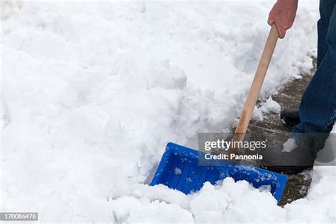 Old Man Shoveling Snow Photos and Premium High Res Pictures - Getty Images