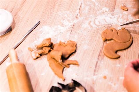 Premium Photo Close Up Hands Kneading A Dough On A Wooden Table