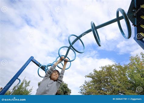 Japanese Student Girl Playing with a Monkey Bars Stock Image - Image of people, girl: 260647781