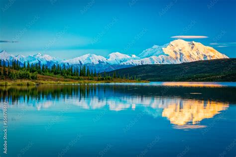 Sunset glow on Mount Denali (McKinley) reflects on Wonder Lake in ...