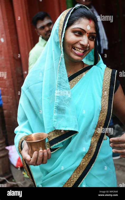 Indian woman wearing saree hi-res stock photography and images - Alamy