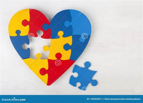 A Colorful Heart Made Of Symbolic Autism Puzzle Pieces Stock Image