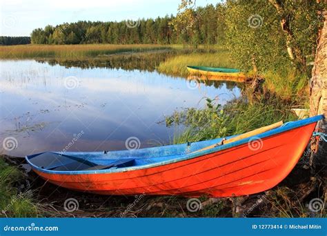 Wooden boats on the lake. stock photo. Image of silence - 12773414