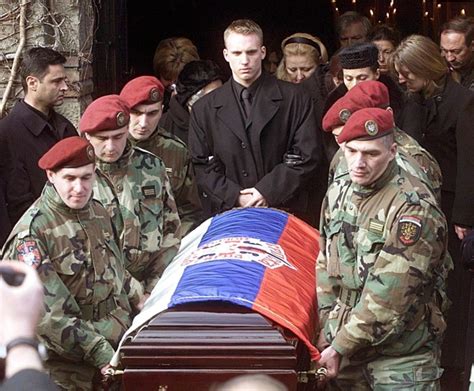 Members Of Arkans Serbian Volunteer Guard Known As The Tigers Carry